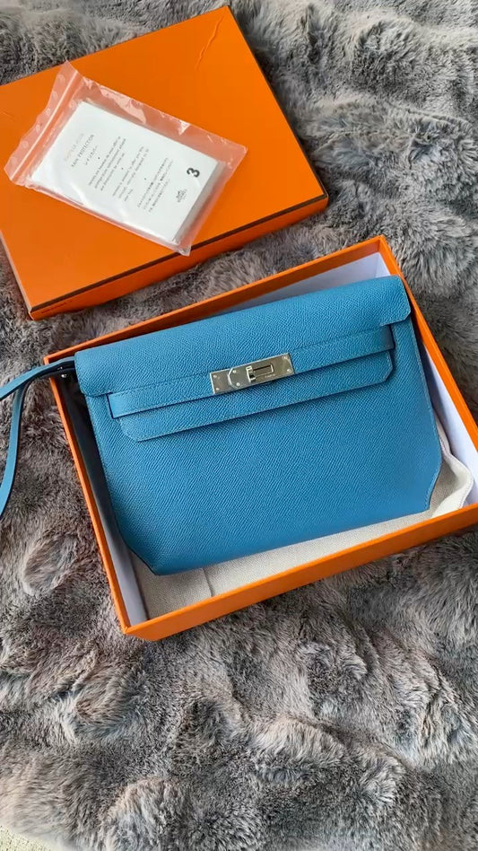 Luxury Blue Leather Wristlet Pouch - Elegant Kelly Style Handbag with Gold Hardware and Signature Orange Box