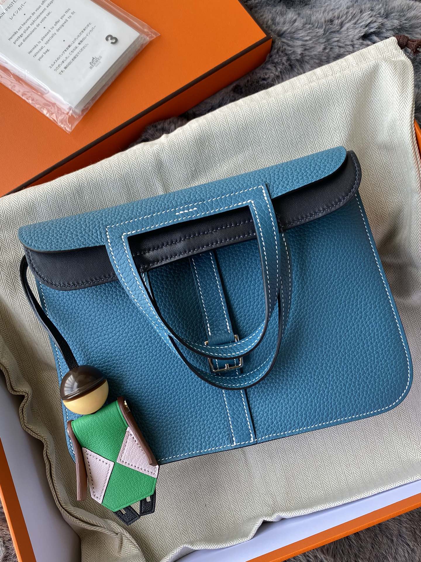 Hermès Blue Leather Halzan Style Handbag with Charm in Signature Box