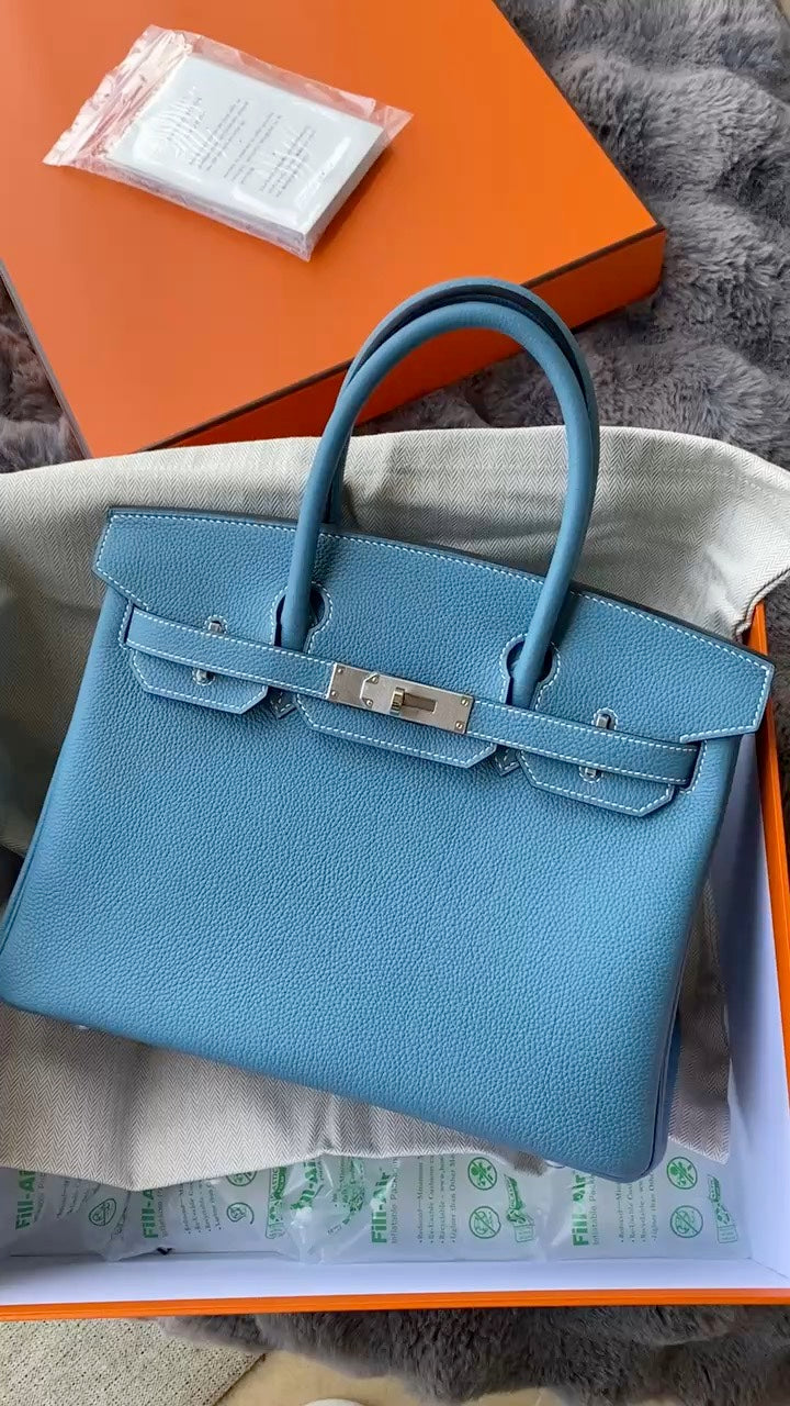 Elegant Light Blue Leather Top Handle Handbag with Silver Hardware - Luxury Birkin Style