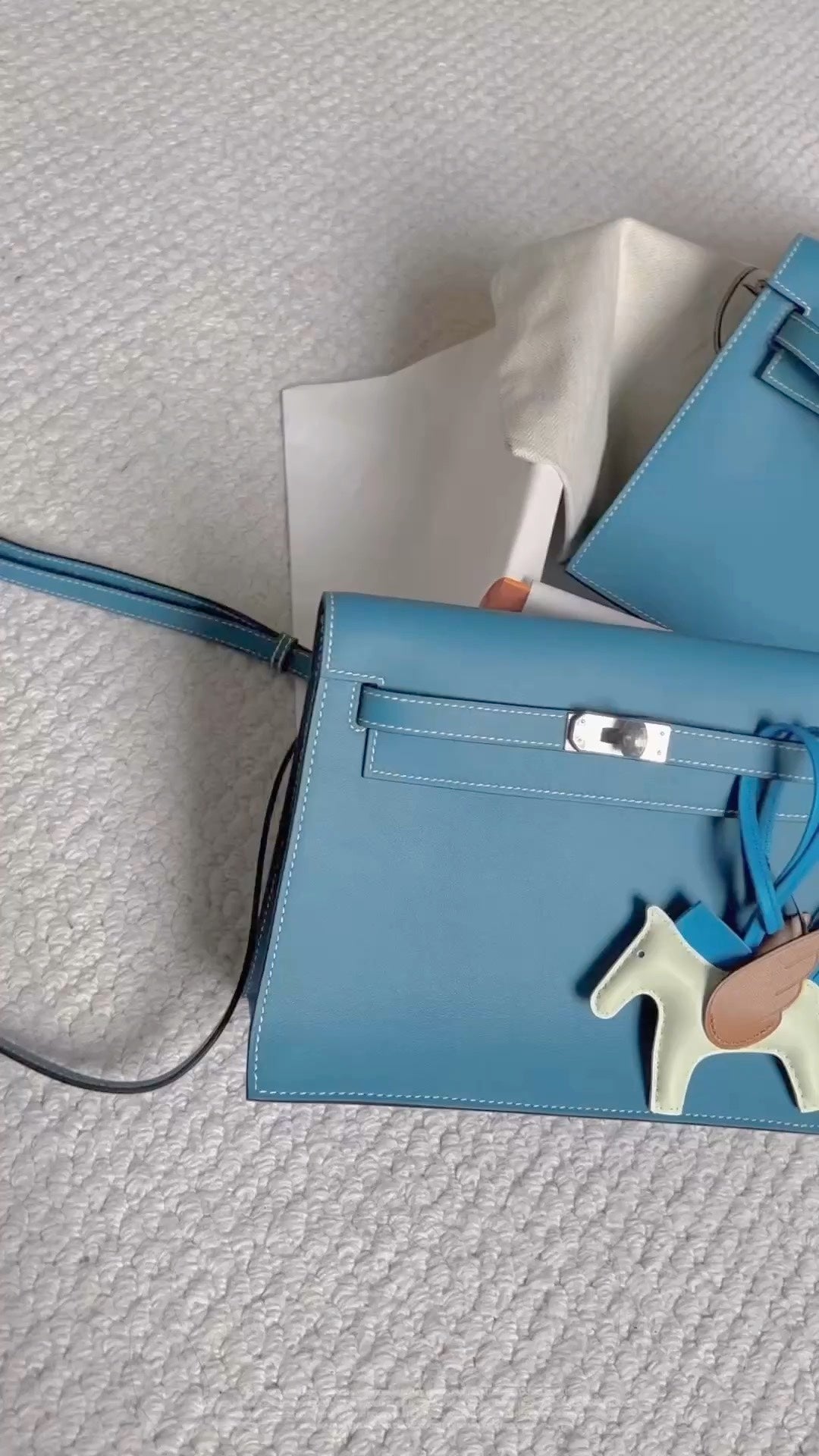 Elegant Blue Leather Kelly Style Handbag with Horse Charm