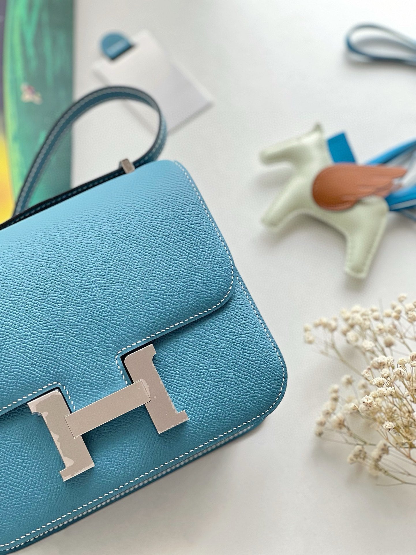 Elegant Blue Leather Mini Crossbody Bag with H-Hardware and Pegasus Charm