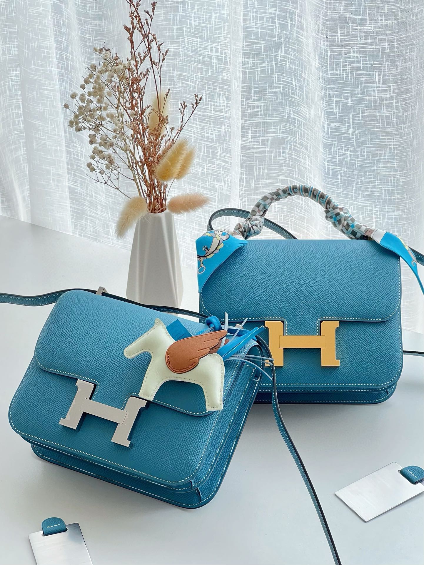 Elegant Blue Leather Mini Crossbody Bag with H-Hardware and Pegasus Charm