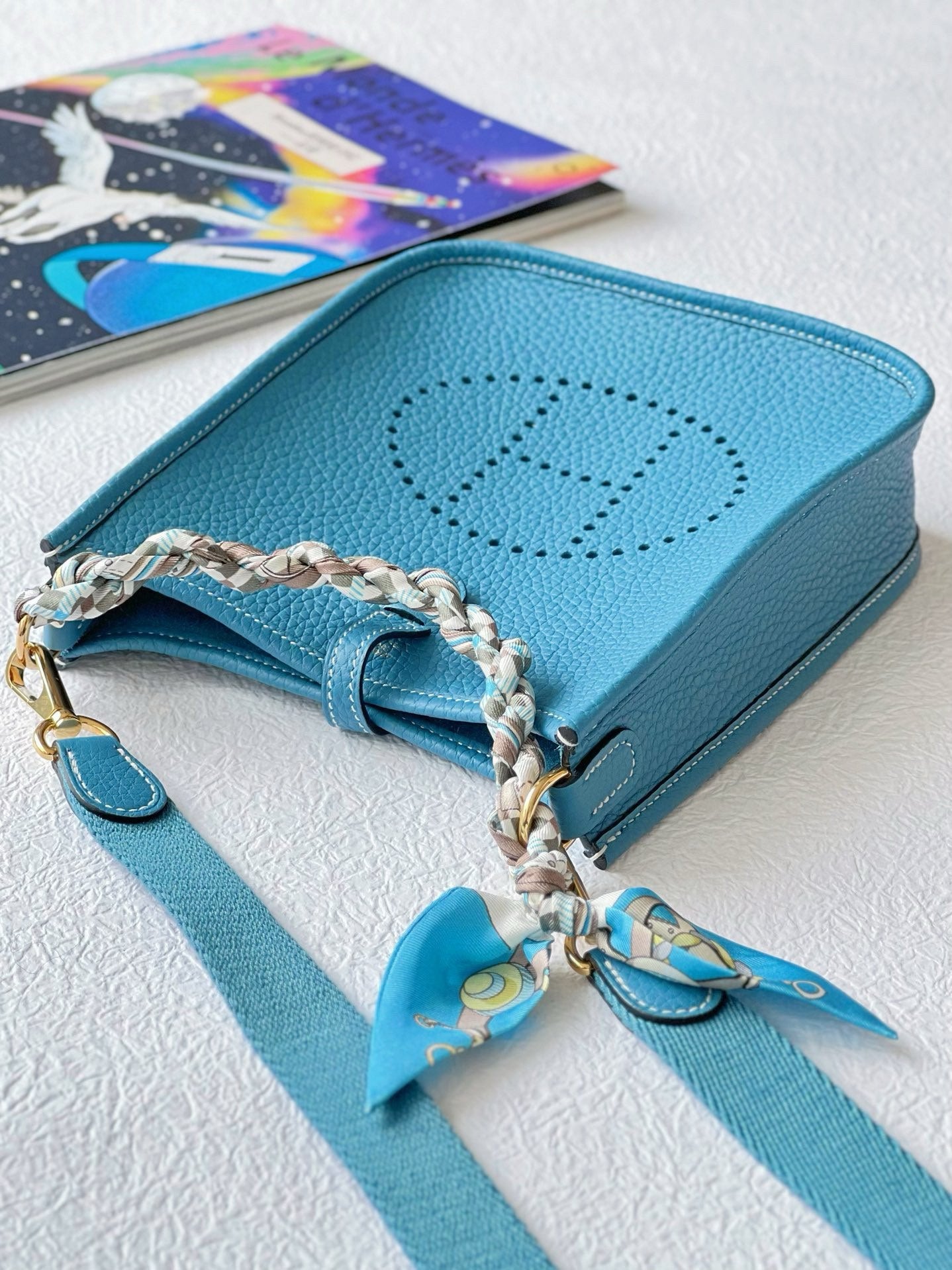 Turquoise Blue Perforated Leather Crossbody Bag with Pegasus Charm &amp; Chain Handle