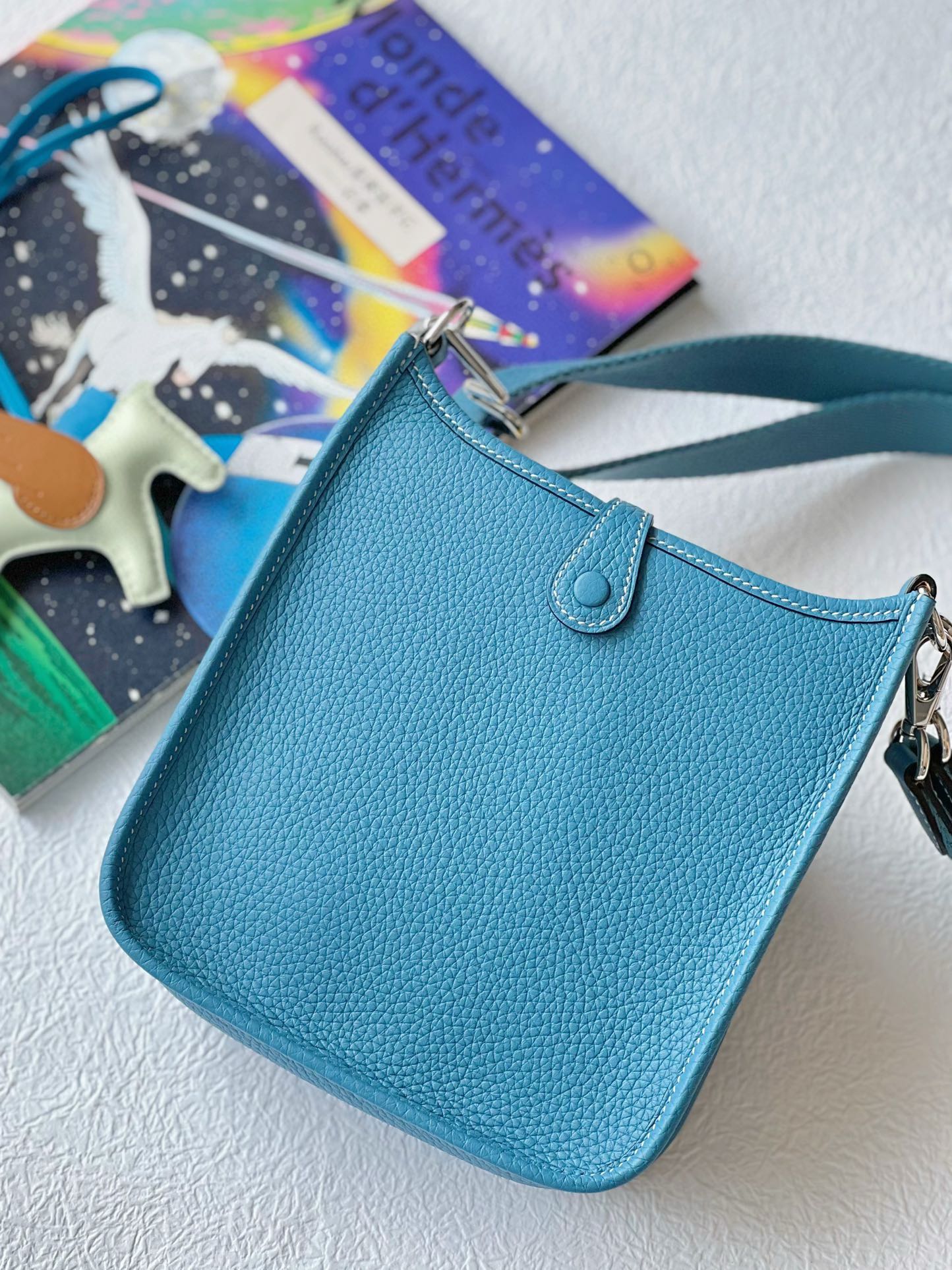 Turquoise Blue Perforated Leather Crossbody Bag with Pegasus Charm &amp; Chain Handle
