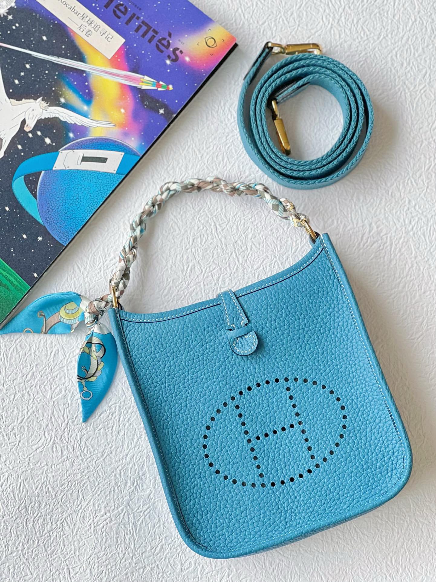 Turquoise Blue Perforated Leather Crossbody Bag with Pegasus Charm &amp; Chain Handle