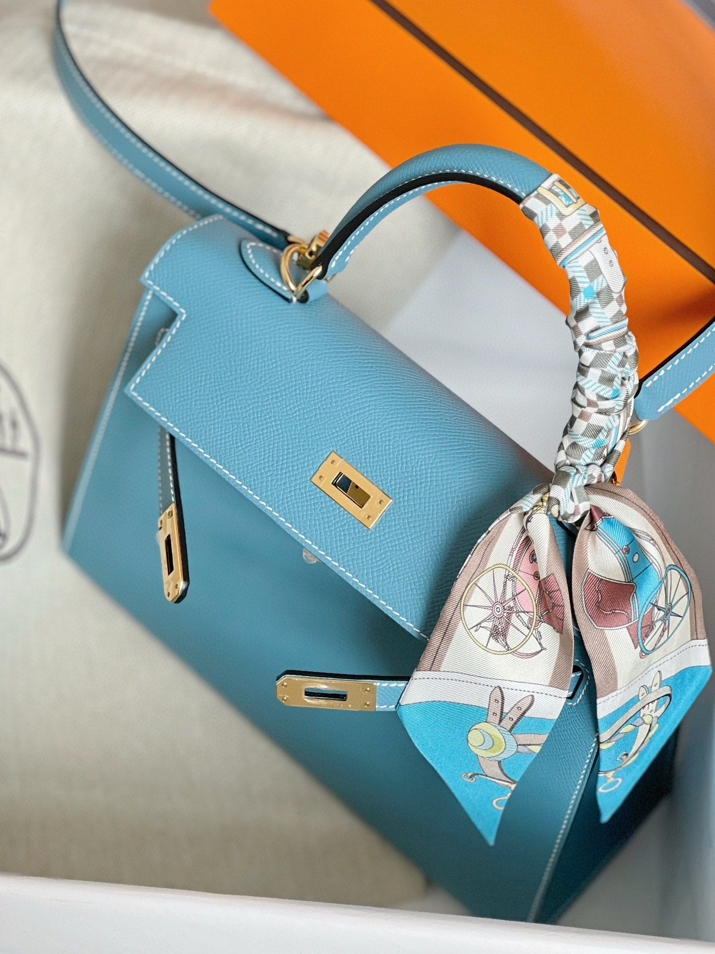 Hermès Kelly Style Light Blue Leather Handbag with Gold Hardware and Twilly Scarf