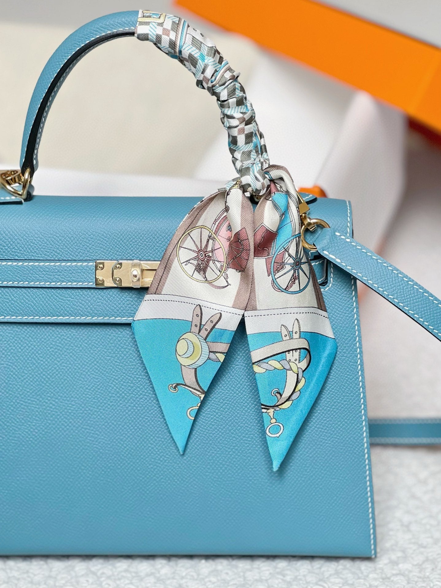 Hermès Kelly Style Light Blue Leather Handbag with Gold Hardware and Twilly Scarf