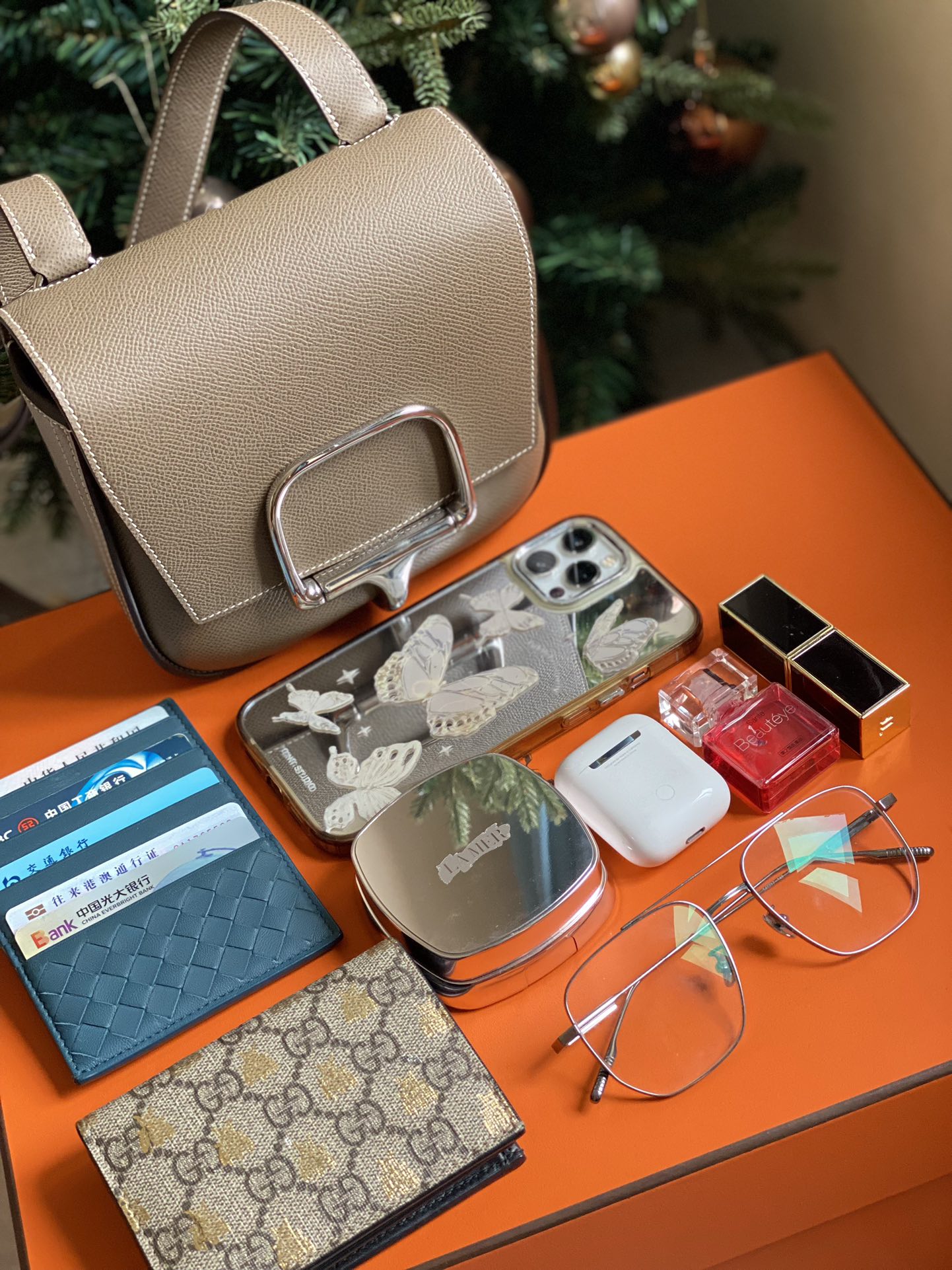 Elegant Beige Textured Leather Handbag with Metal Buckle Detail