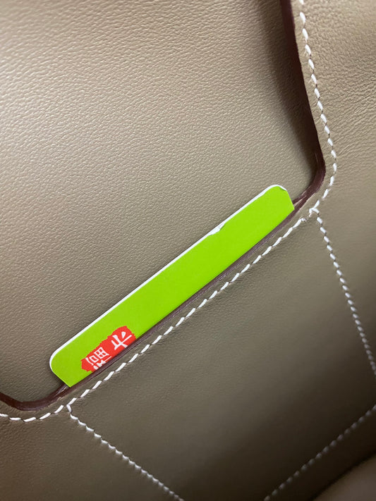 Luxury Taupe Leather Handbag Interior Detail with Practical Card Slot