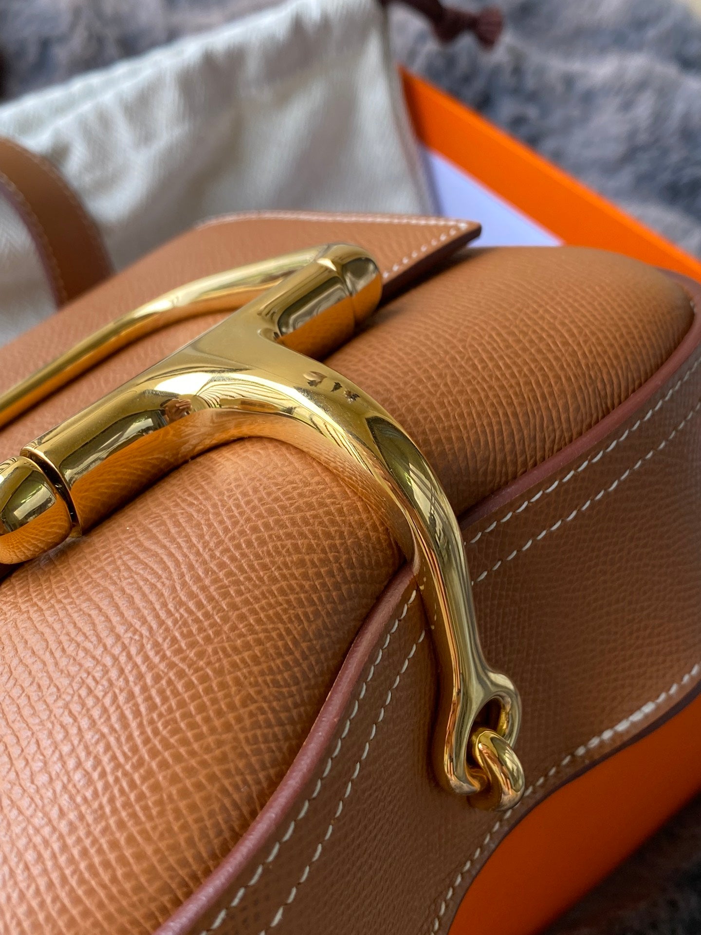 Luxury Tan Grained Leather Shoulder Bag with Statement Gold-Tone Buckle