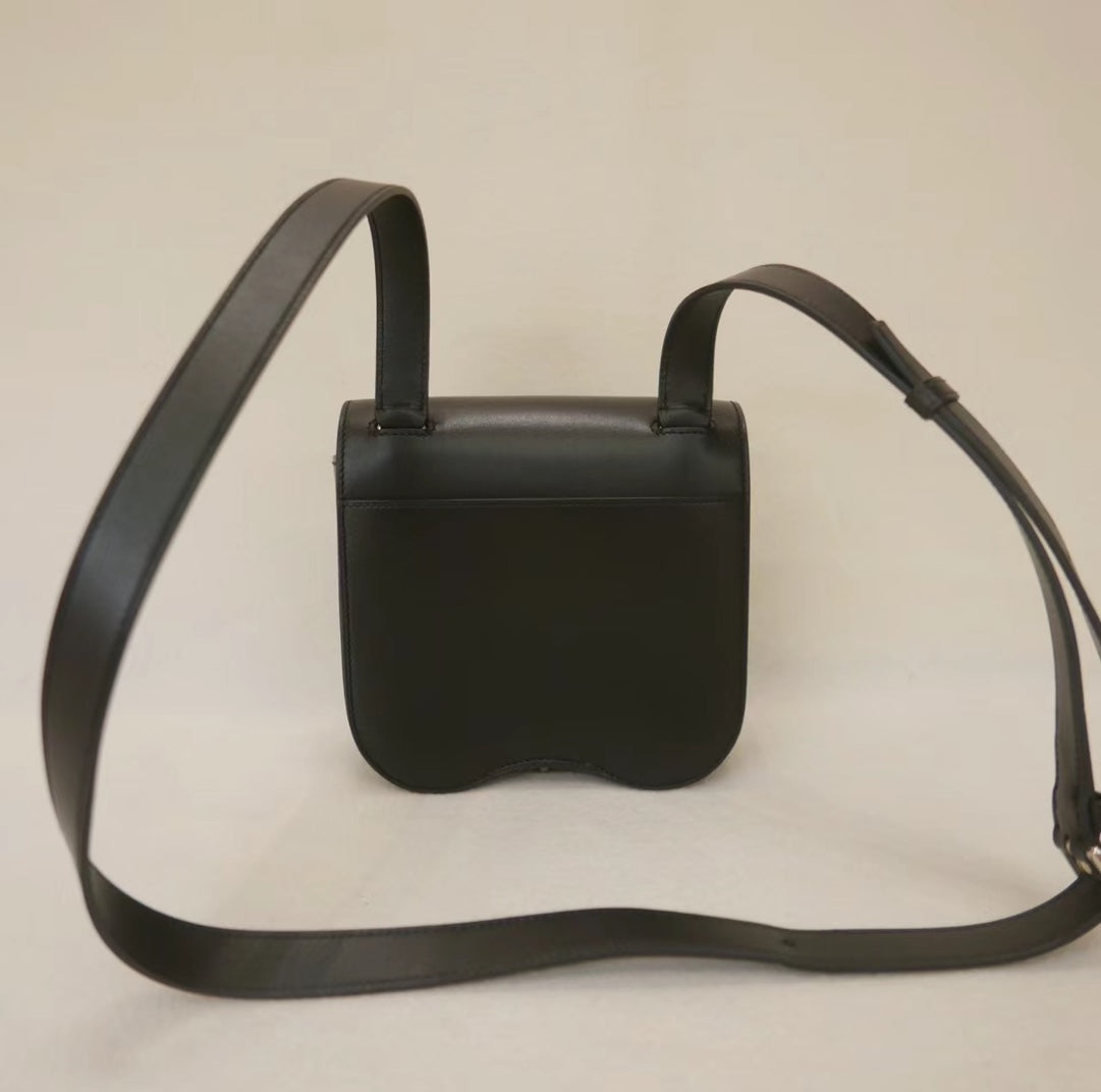 Black Leather Shoulder Bag with Silver Stirrup Hardware