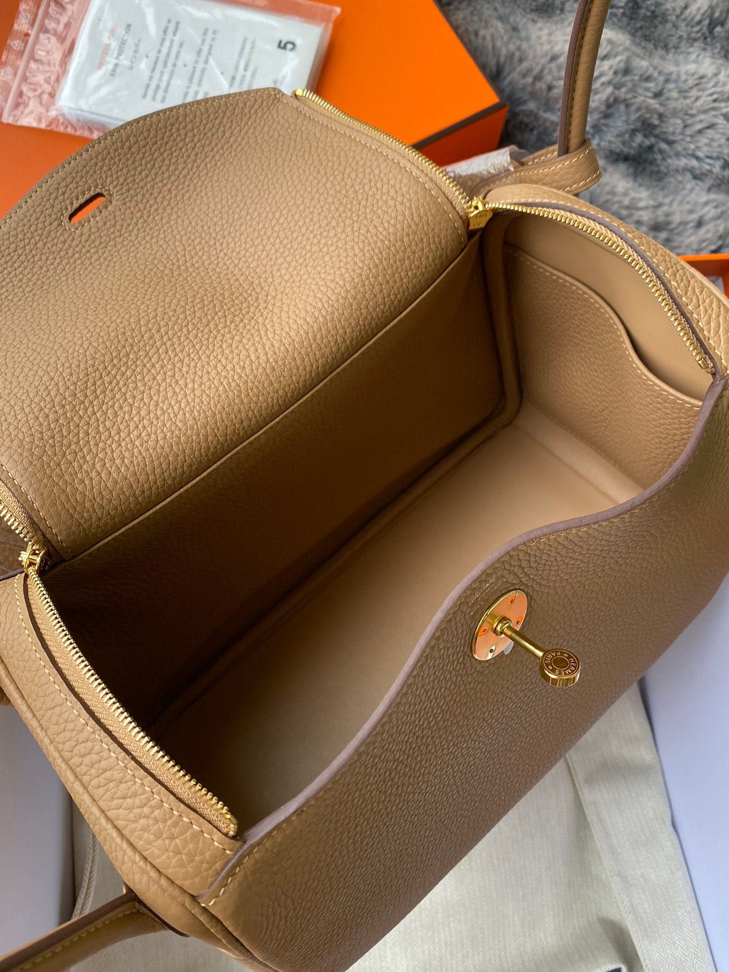 Hermès Lindy Handbag in Tan Leather with Gold-Tone Hardware