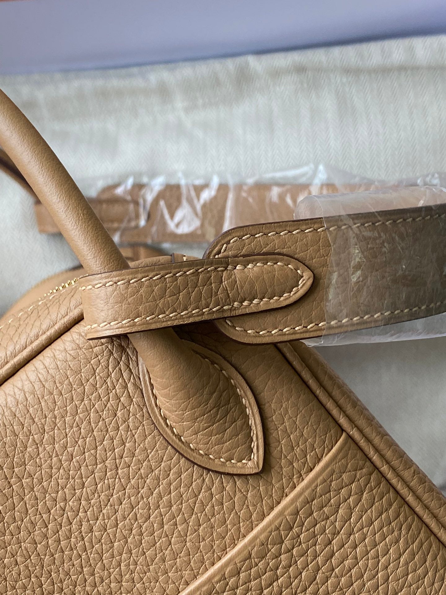 Hermès Lindy Handbag in Tan Leather with Gold-Tone Hardware