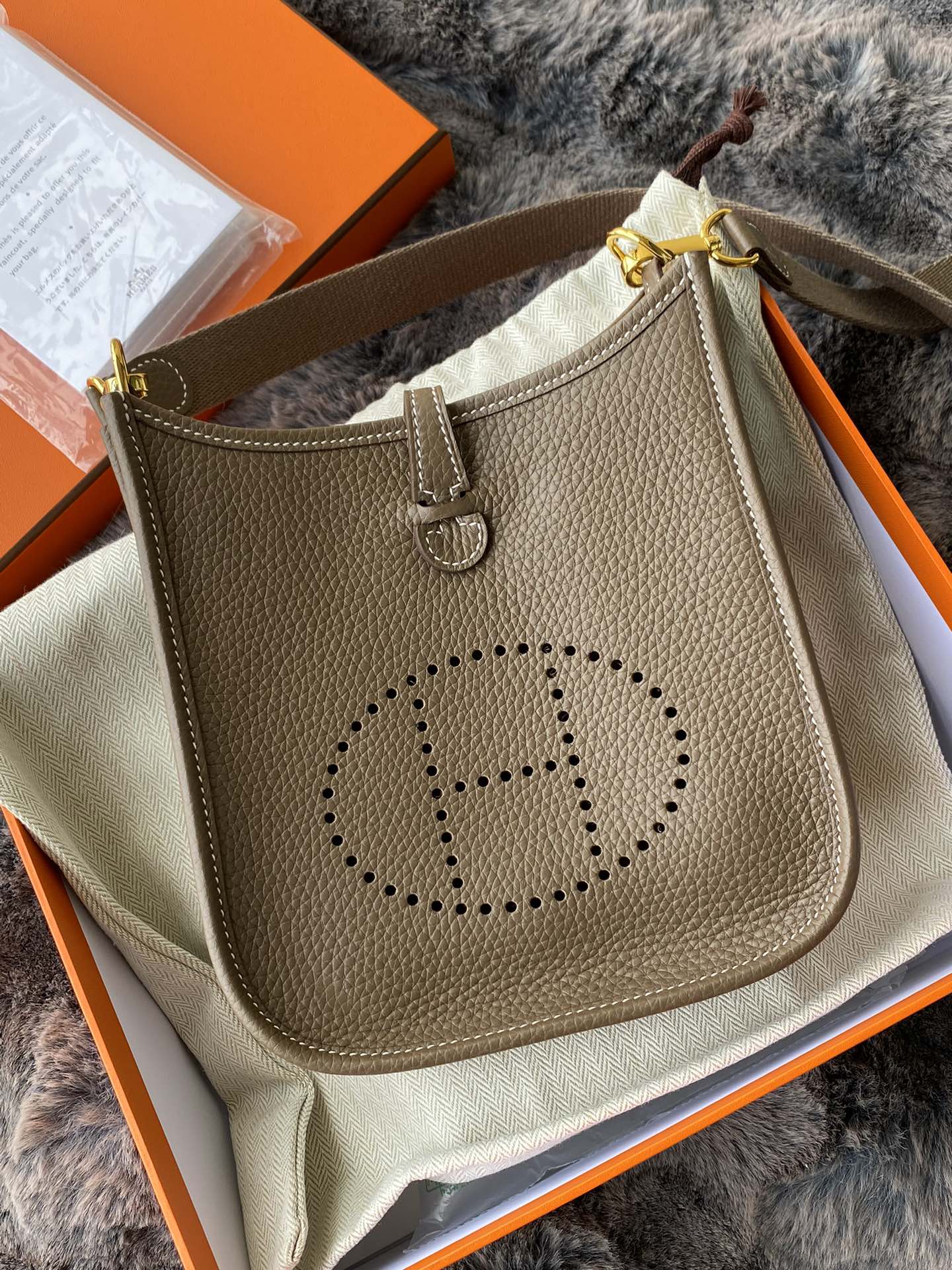 Hermès Evelyne TPM 16 Mini Bag in Etoupe Clemence Leather with Gold Hardware