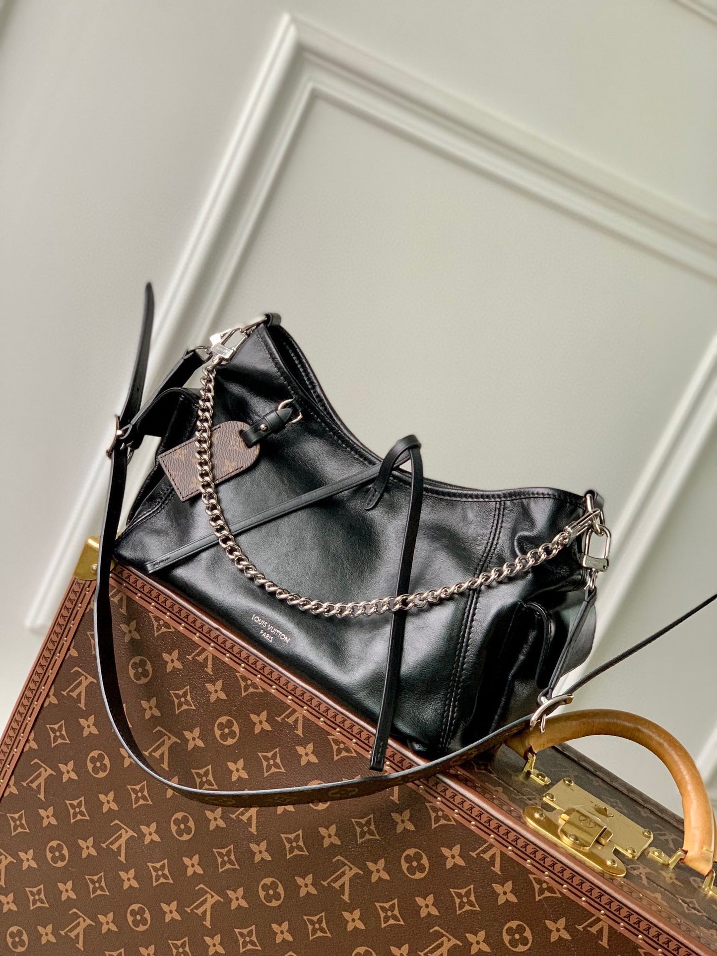Women's Black Slouchy Leather Shoulder Bag with Silver Chain Accent