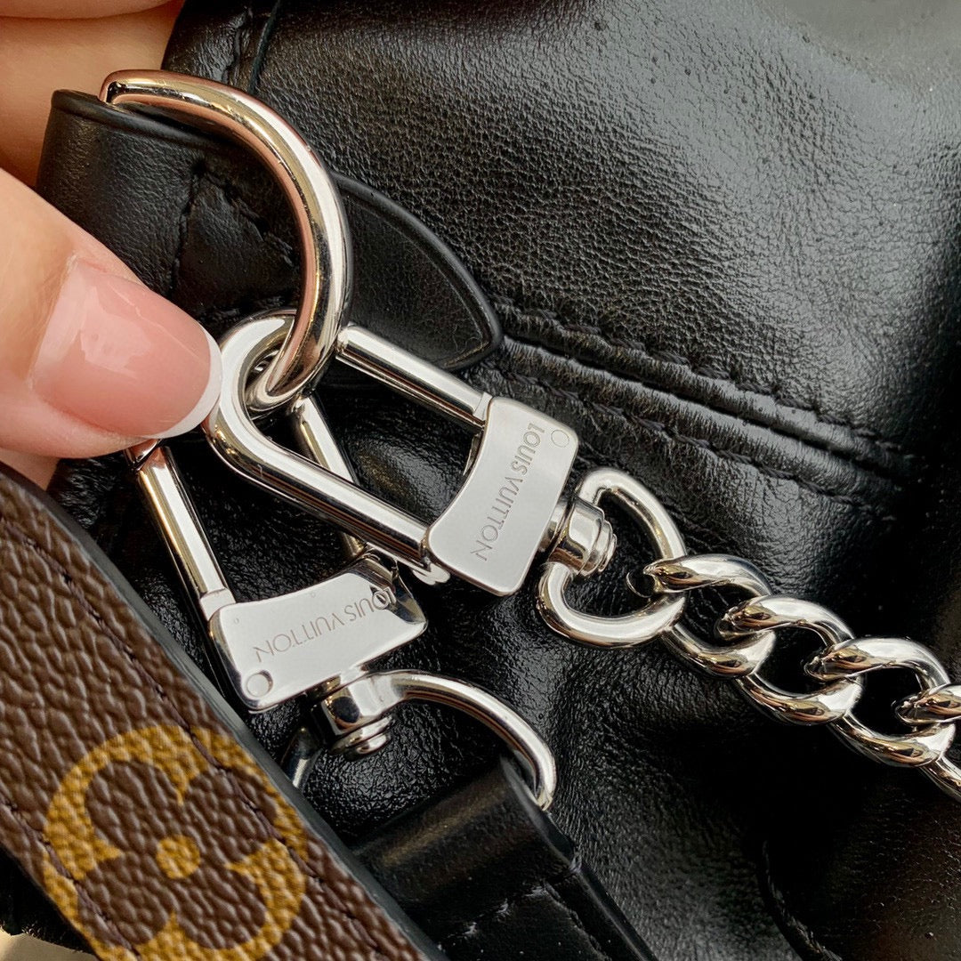 Women's Black Slouchy Leather Shoulder Bag with Silver Chain Accent