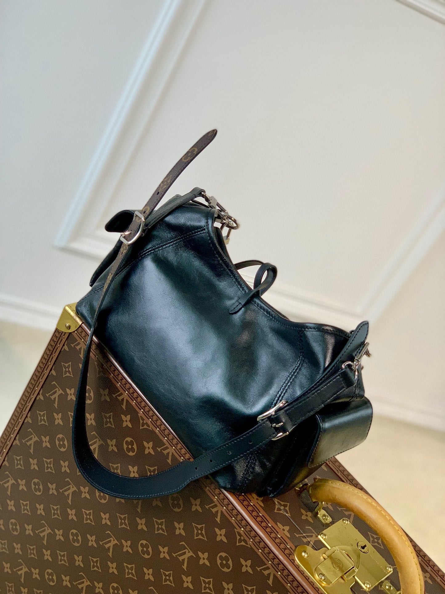 Women's Black Slouchy Leather Shoulder Bag with Silver Chain Accent