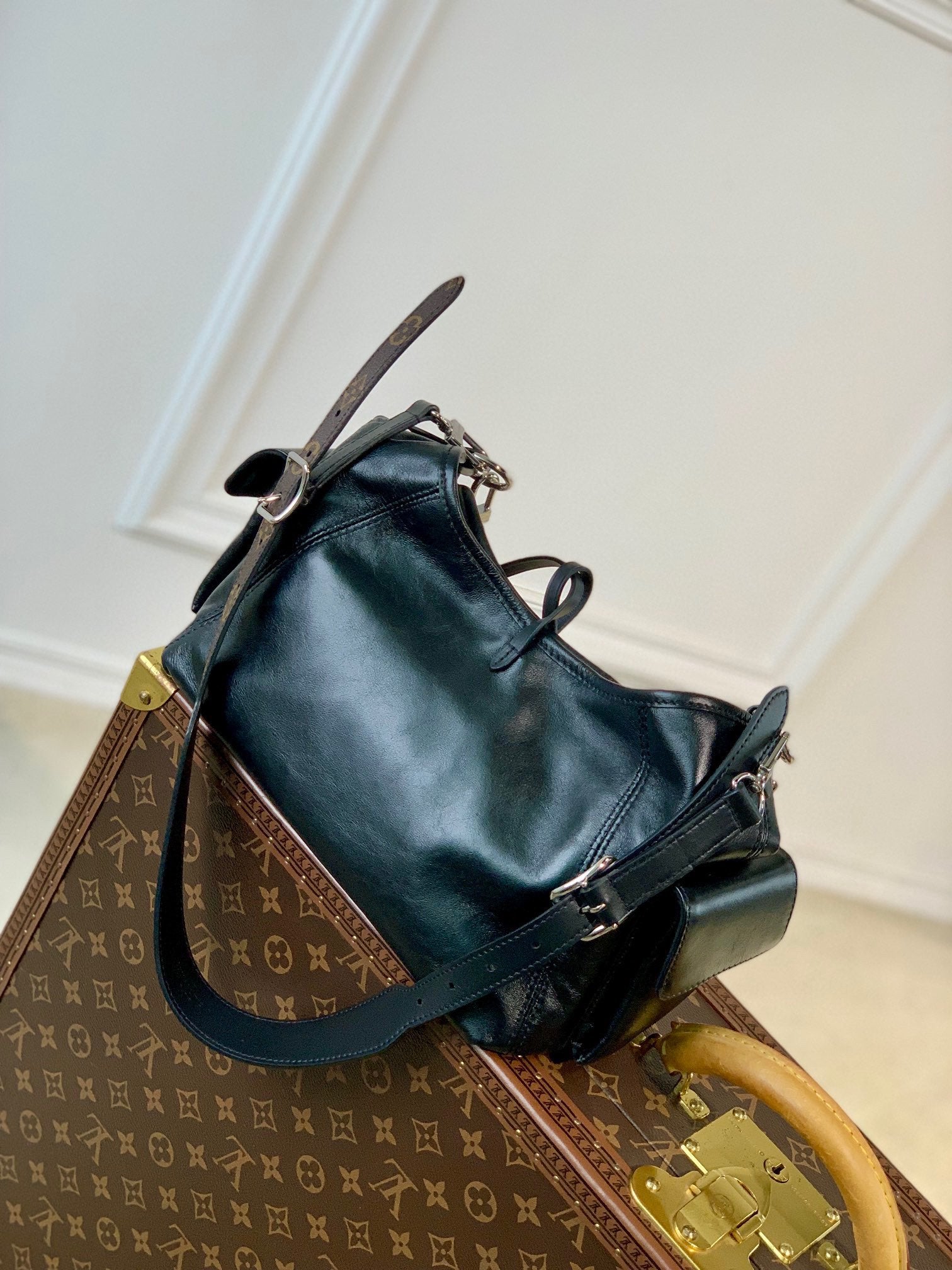 Women's Black Slouchy Leather Shoulder Bag with Silver Chain Accent