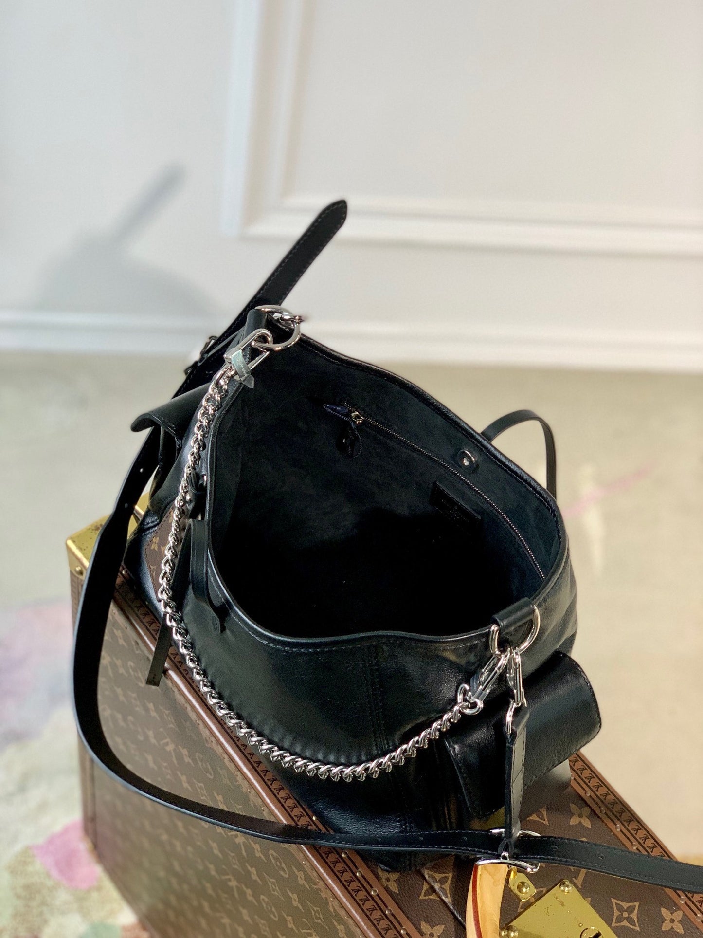 Women's Black Slouchy Leather Shoulder Bag with Silver Chain Accent