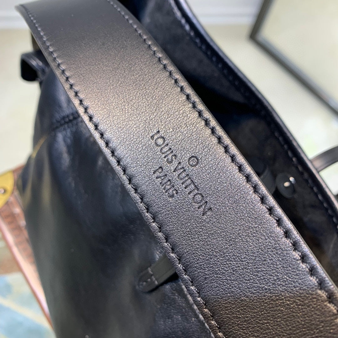 Women's Black Slouchy Leather Shoulder Bag with Silver Chain Accent
