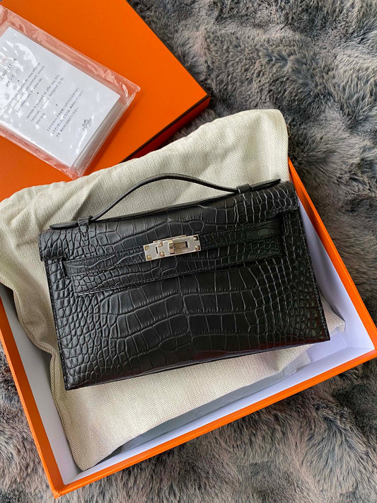 Hermès Kelly Cut Clutch Bag Black Shiny Niloticus Crocodile Palladium Hardware