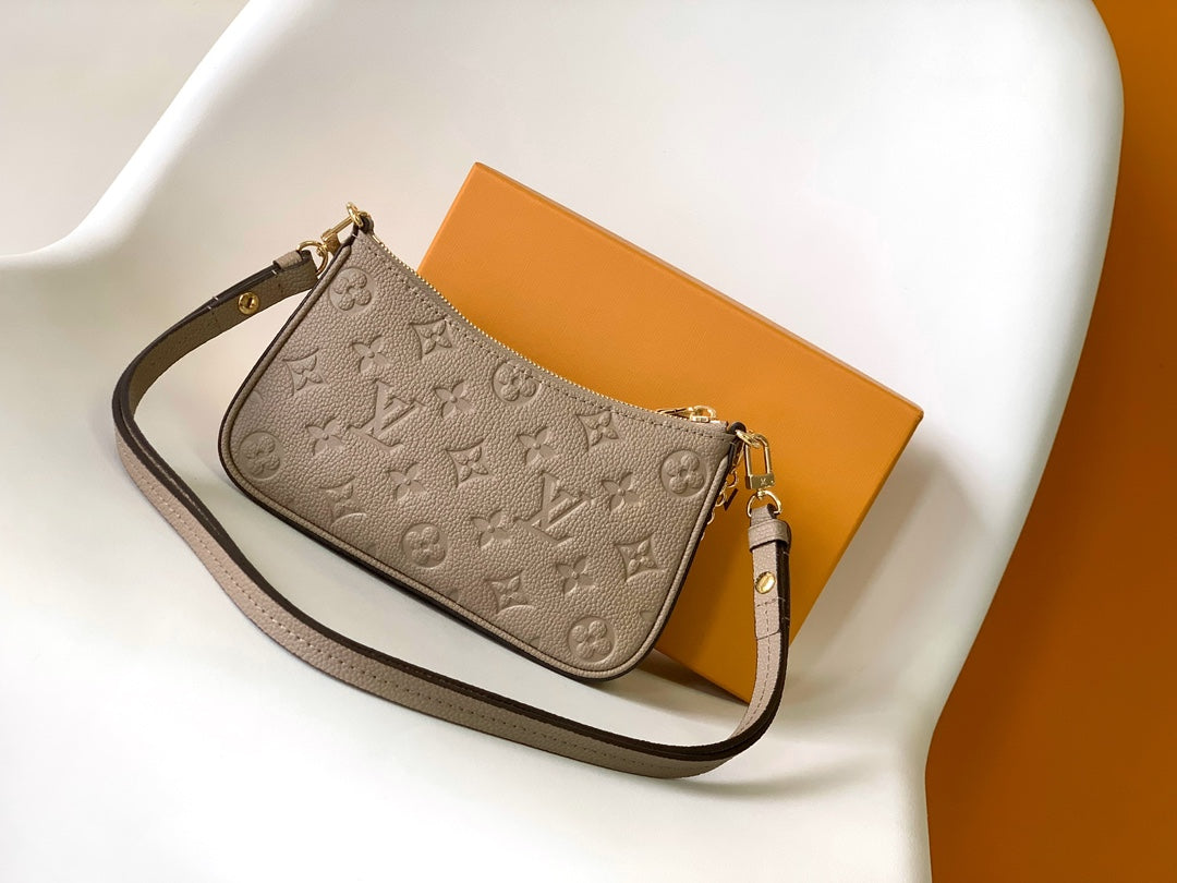 Louis Vuitton Monogram Empreinte Pochette Accessoires - Tourterelle
