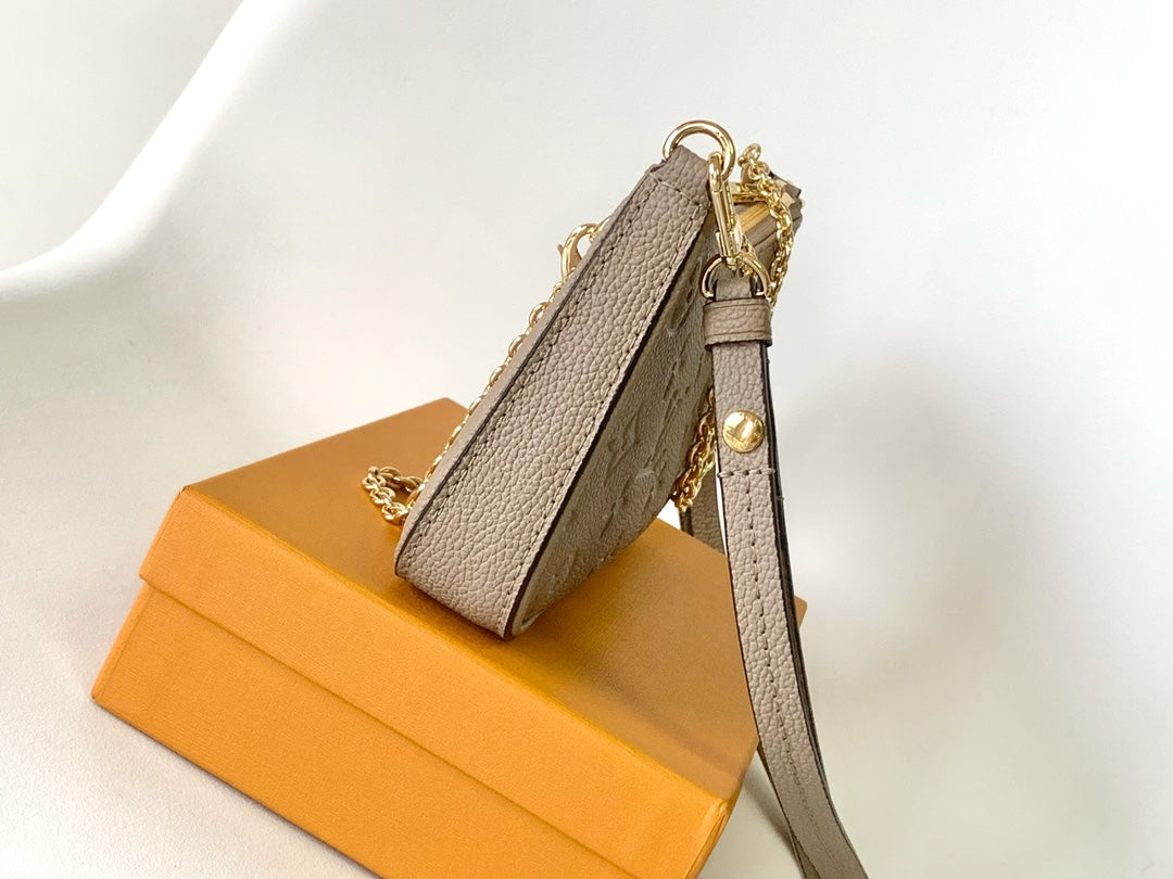 Louis Vuitton Monogram Empreinte Pochette Accessoires - Tourterelle