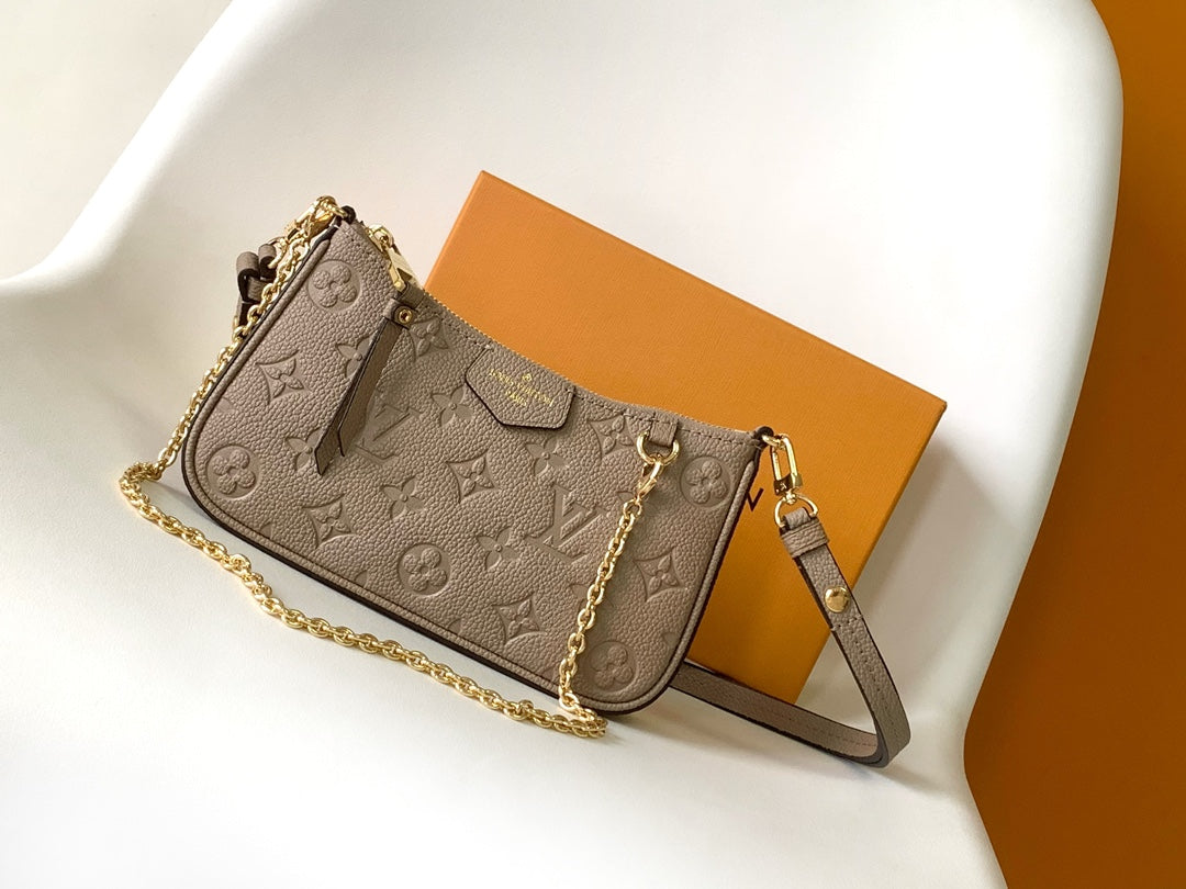 Louis Vuitton Monogram Empreinte Pochette Accessoires - Tourterelle