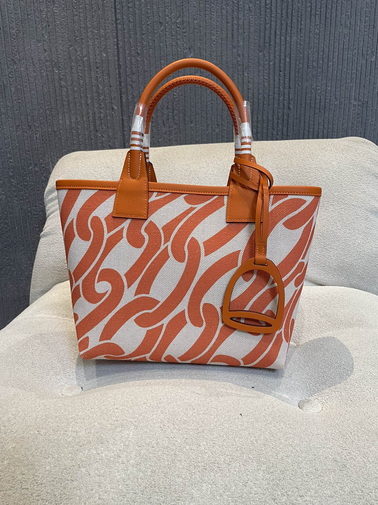 Orange Chain Link Pattern Canvas Tote Bag with Leather Top Handles and Stirrup Charm