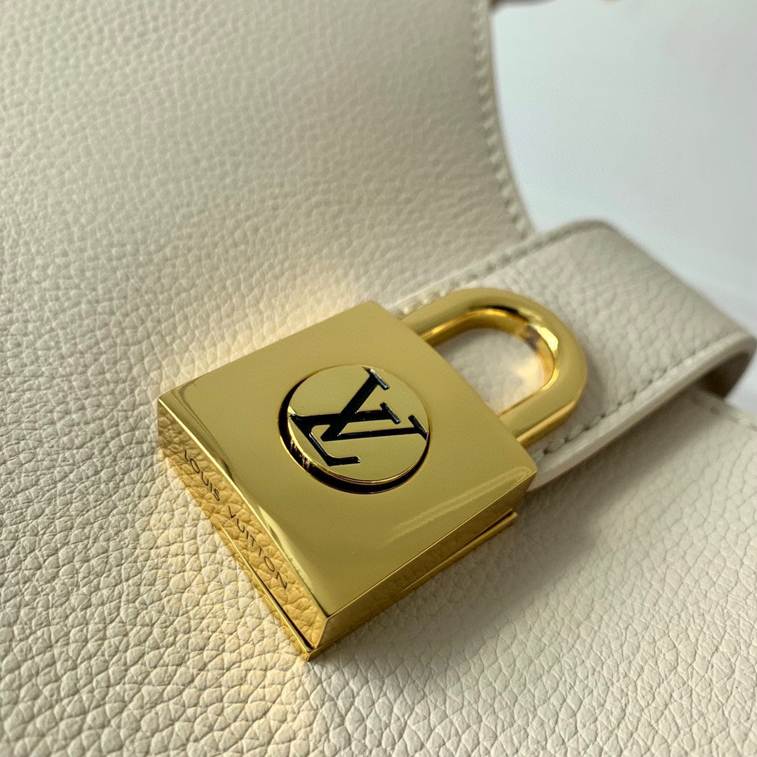 Louis Vuitton Elegant Cream Leather Crescent Shoulder Bag with Gold Lock