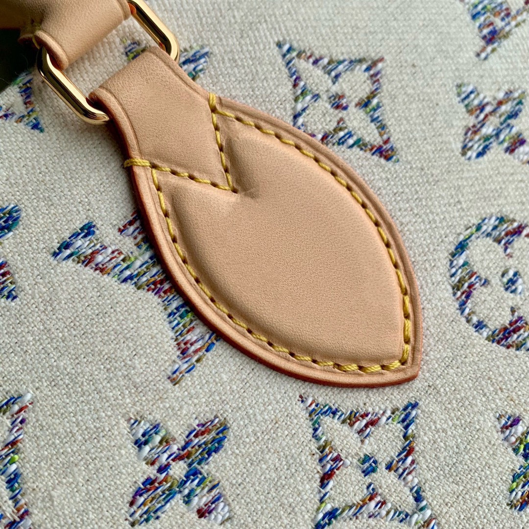 Louis Vuitton OnTheGo MM Monogram Empreinte Giant Bicolor Tote Bag - Cream/Blue