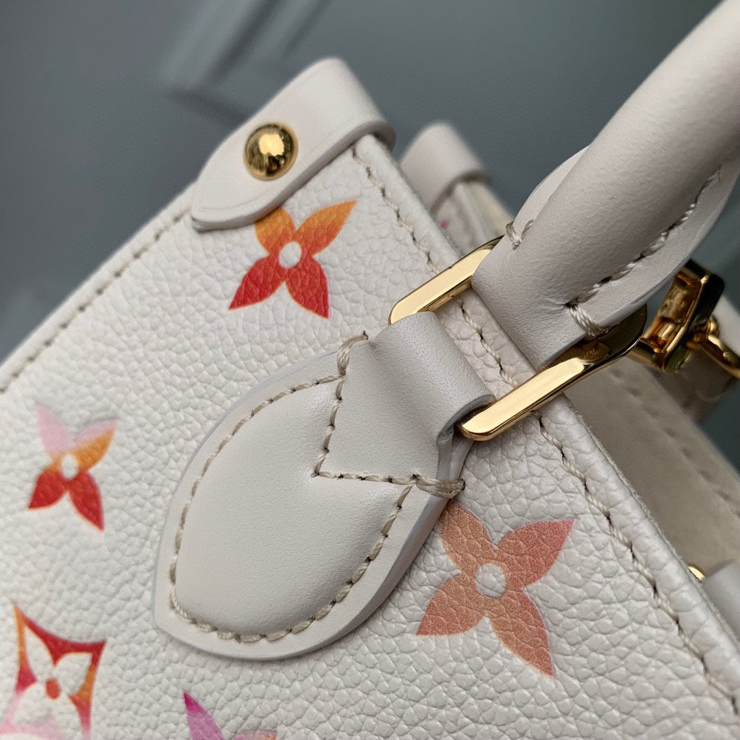 Louis Vuitton Petit Palais Monogram Empreinte Summer Gradient Handbag