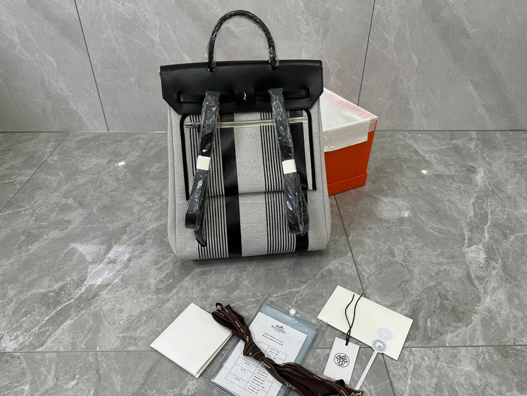 Designer-Inspired Grey and White Striped Canvas Handbag with Black Leather Flap