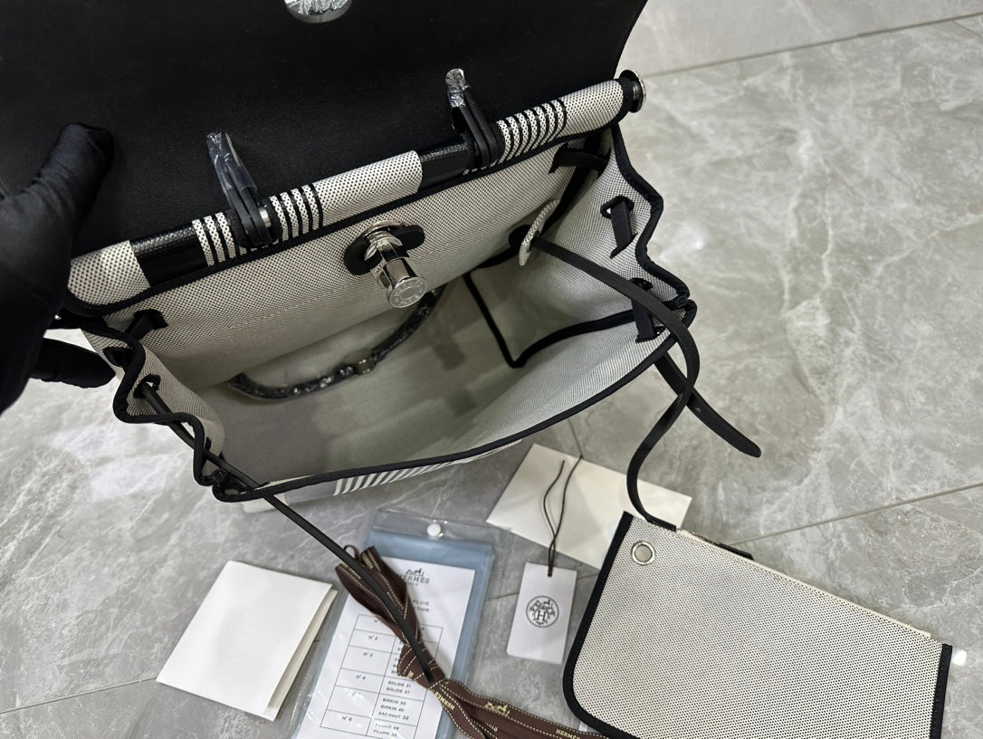Designer-Inspired Grey and White Striped Canvas Handbag with Black Leather Flap
