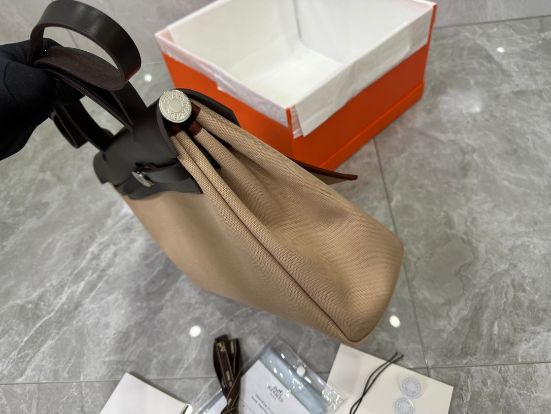 Hermès Herbag Zip Canvas &amp; Leather Handbag - Tan and Black