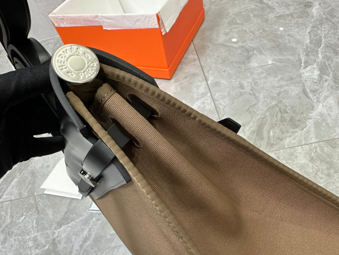 Brown and Black Canvas Top Handle Bag with Leather Trim and Silver Hardware