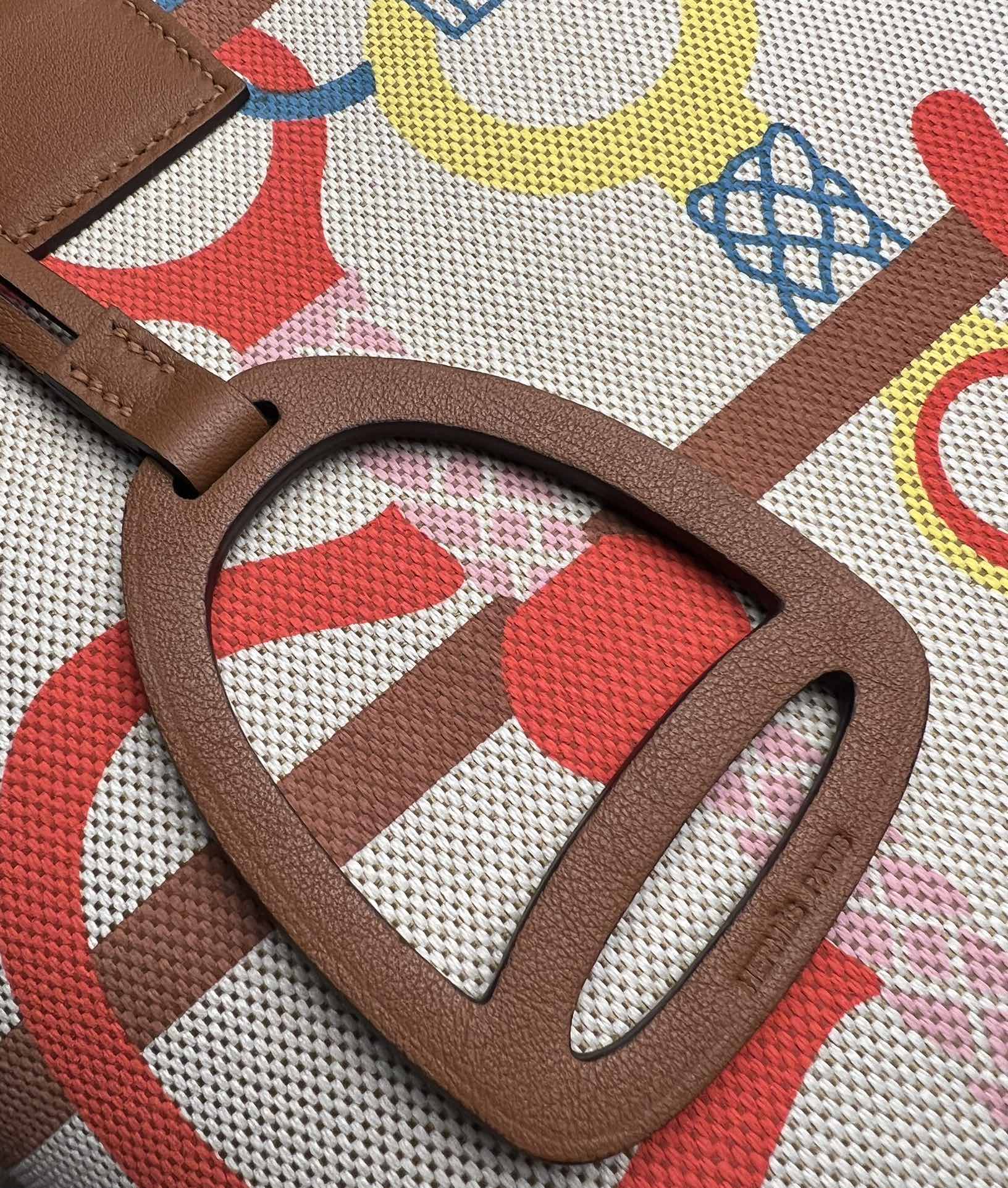 Luxury Stirrup Print Canvas Handbag with Brown Leather Detail