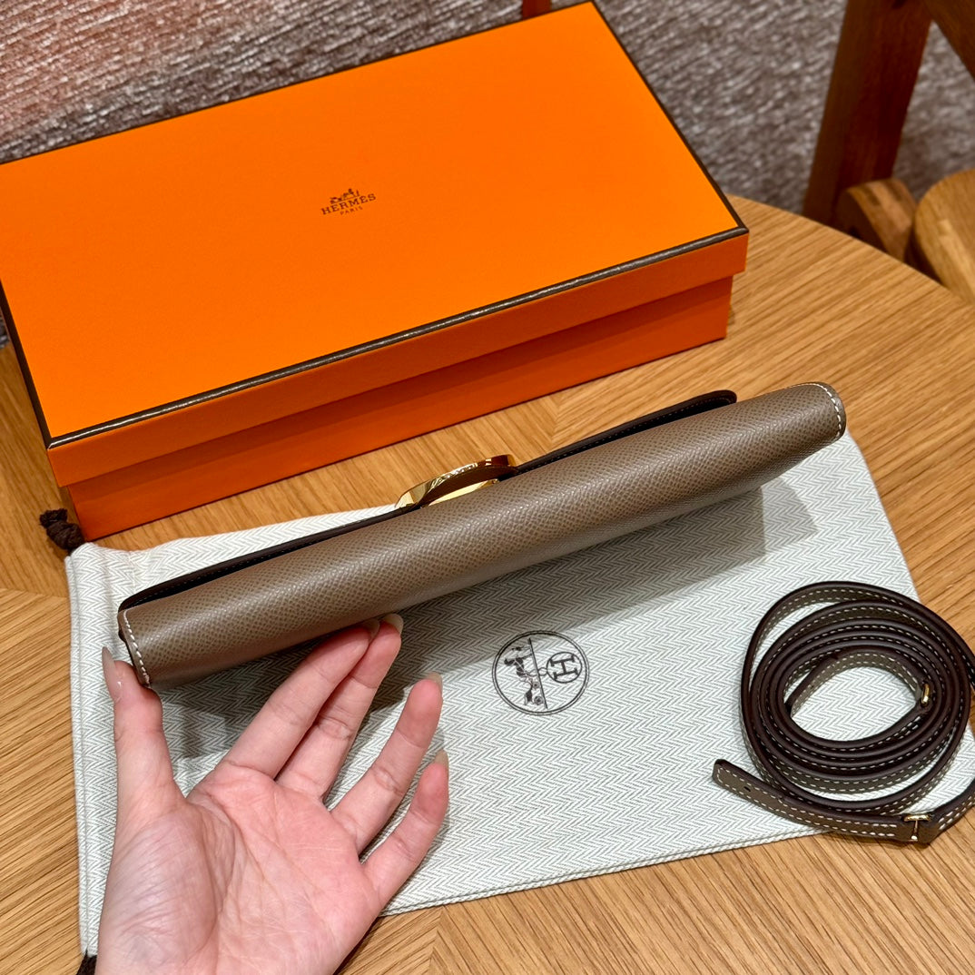 Hermès In-the-Loop Clutch Bag - Etoupe Leather with Gold Hardware