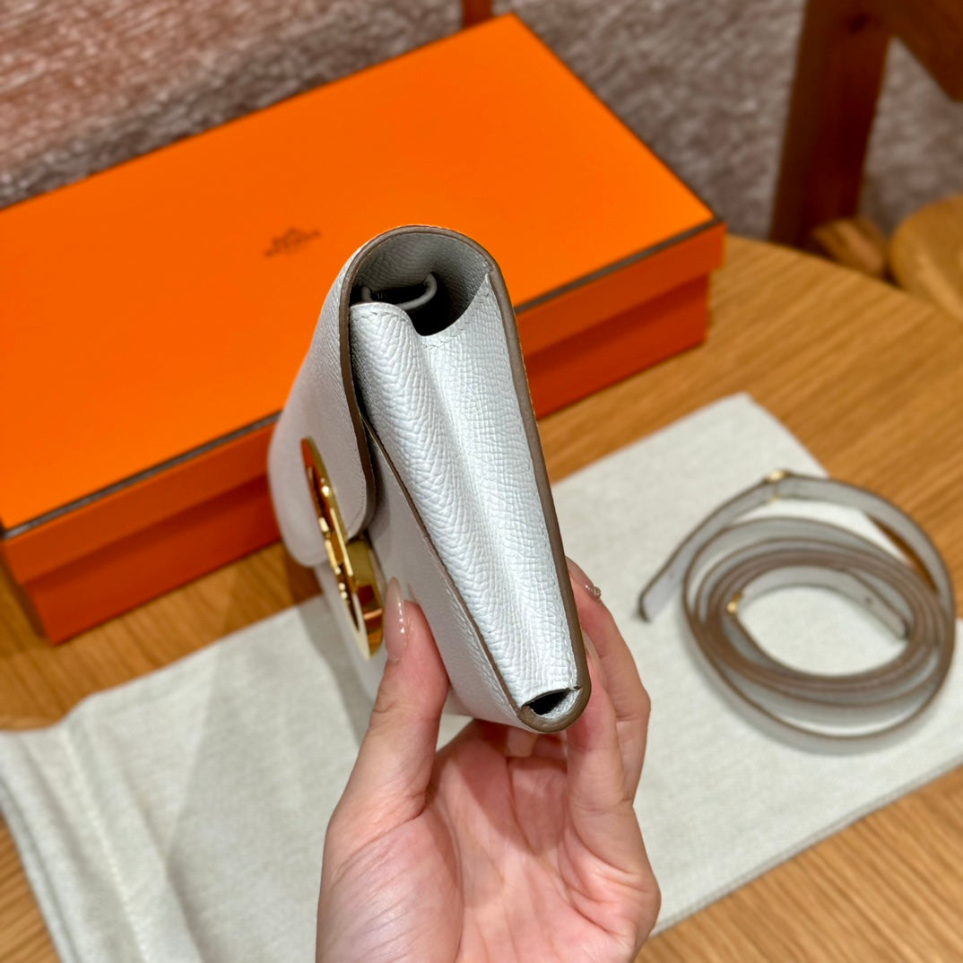 Hermès White Leather Clutch Bag with Gold-Tone Hardware and Detachable Strap
