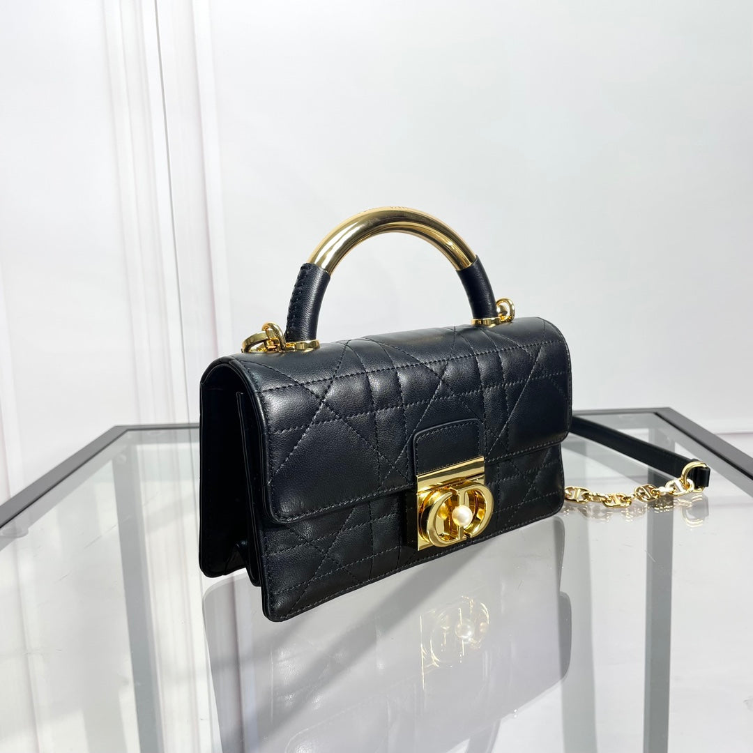 Black Quilted Leather Top Handle Handbag with Gold-Tone Hardware