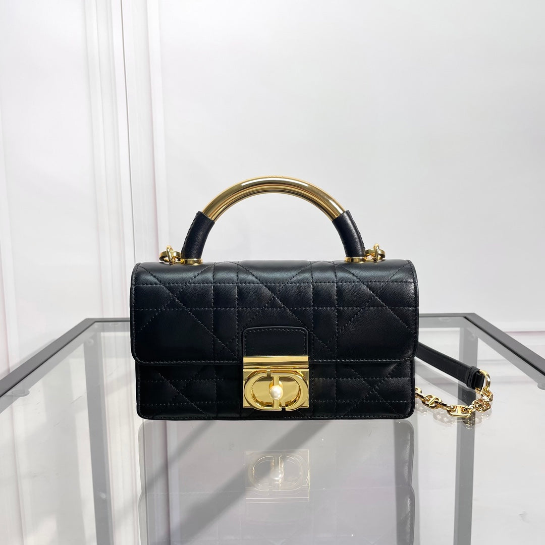 Black Quilted Leather Top Handle Handbag with Gold-Tone Hardware