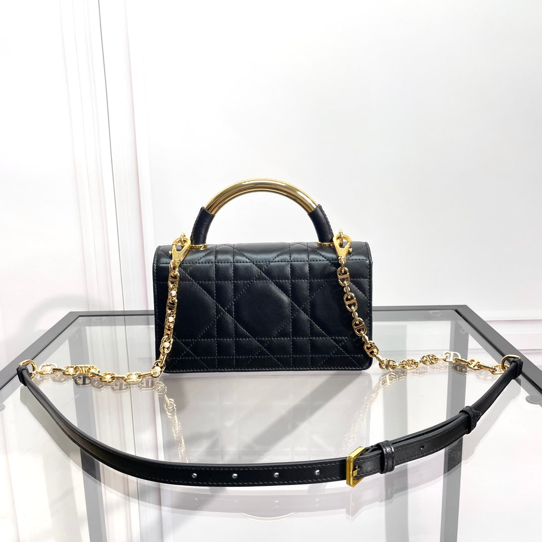 Black Quilted Leather Top Handle Handbag with Gold-Tone Hardware