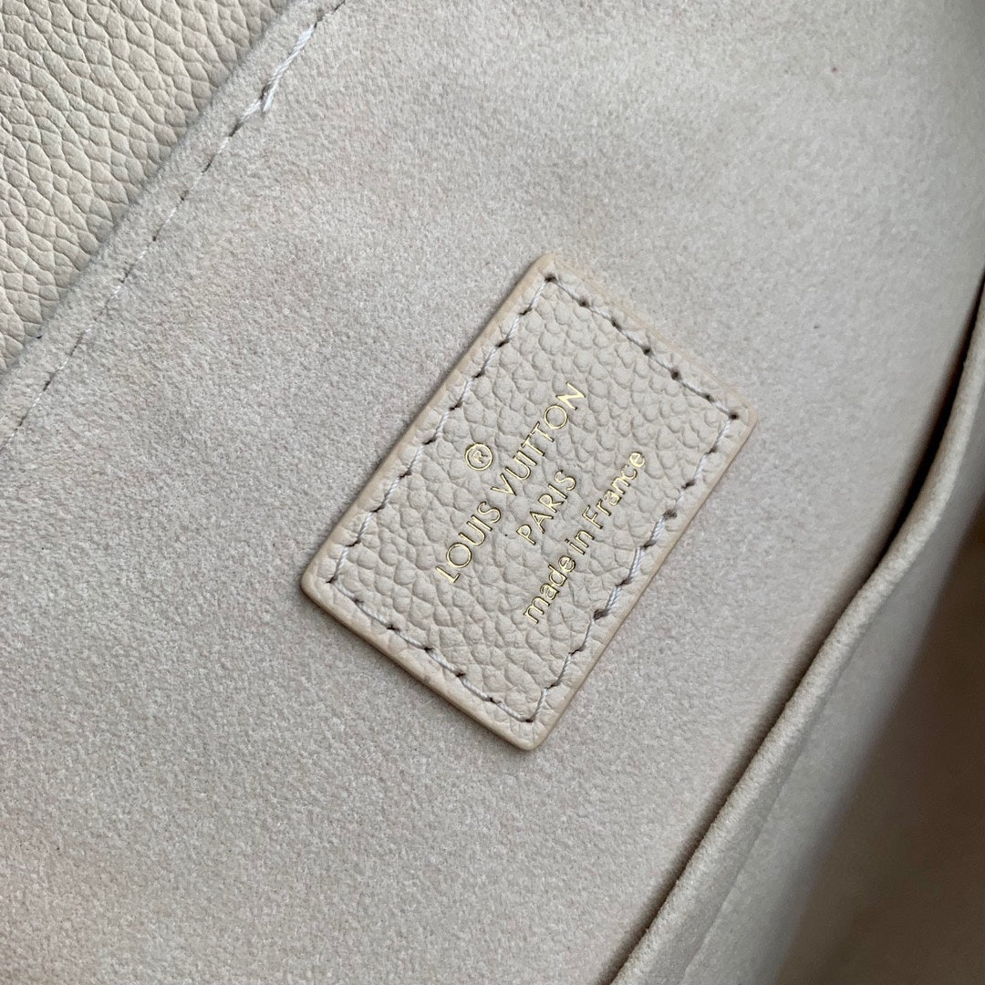 Louis Vuitton Montsouris BB Backpack in Monogram Empreinte Leather - Cream