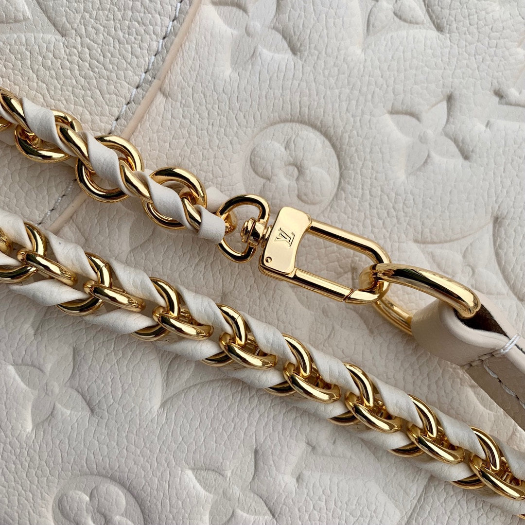 Louis Vuitton Montsouris BB Backpack in Monogram Empreinte Leather - Cream