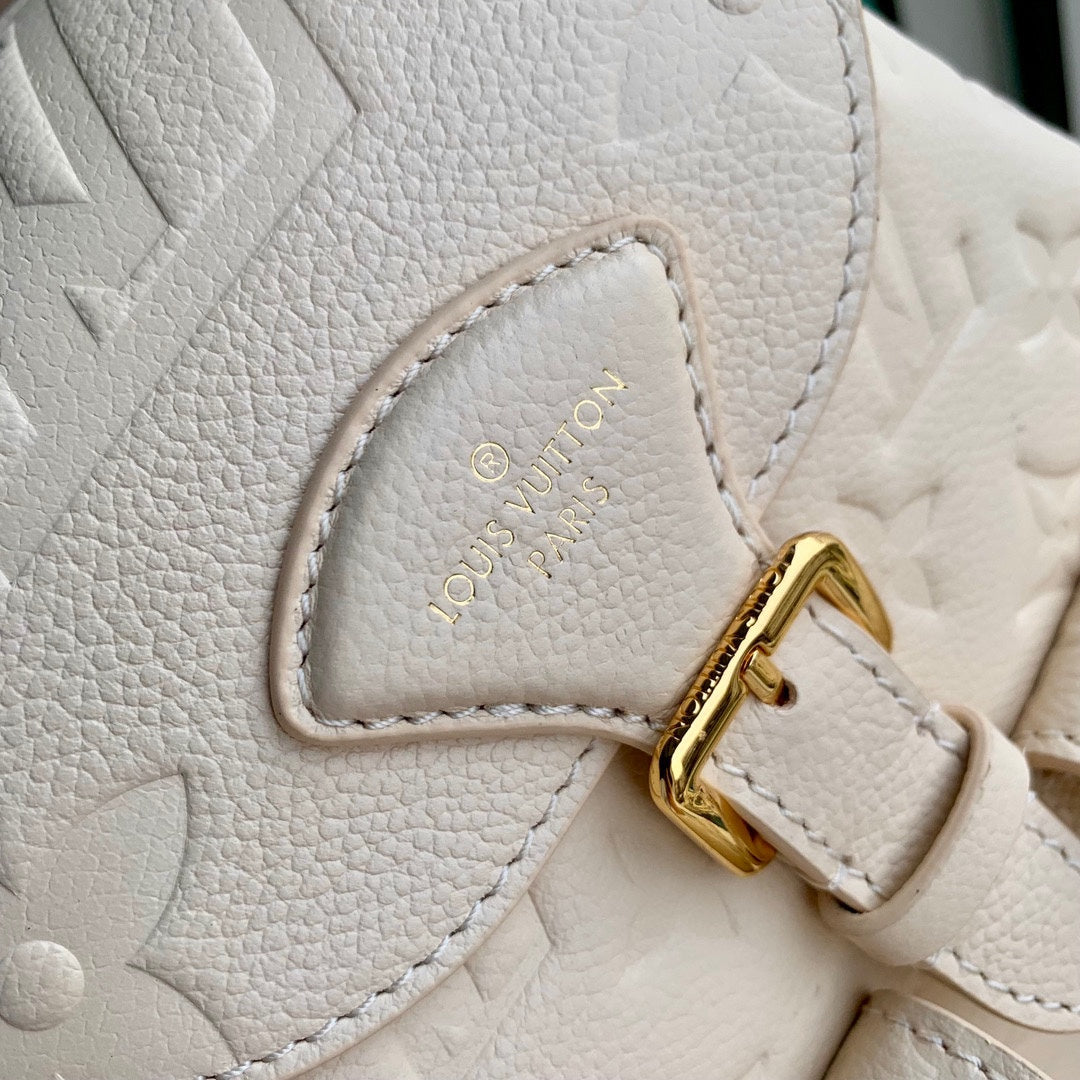 Louis Vuitton Montsouris BB Backpack in Monogram Empreinte Leather - Cream