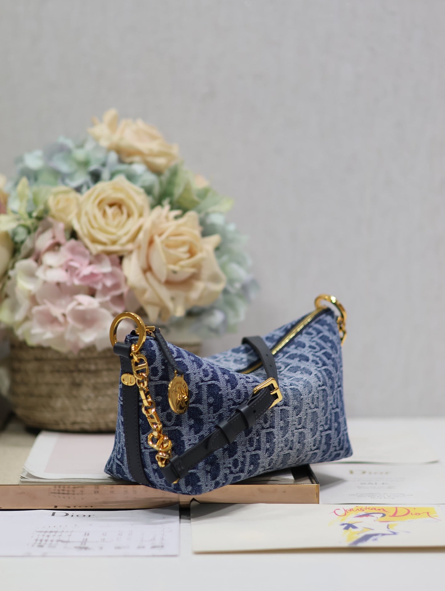 Chic Blue Monogram Oblique Hobo Bag with Gold Chain and Adjustable Shoulder Strap