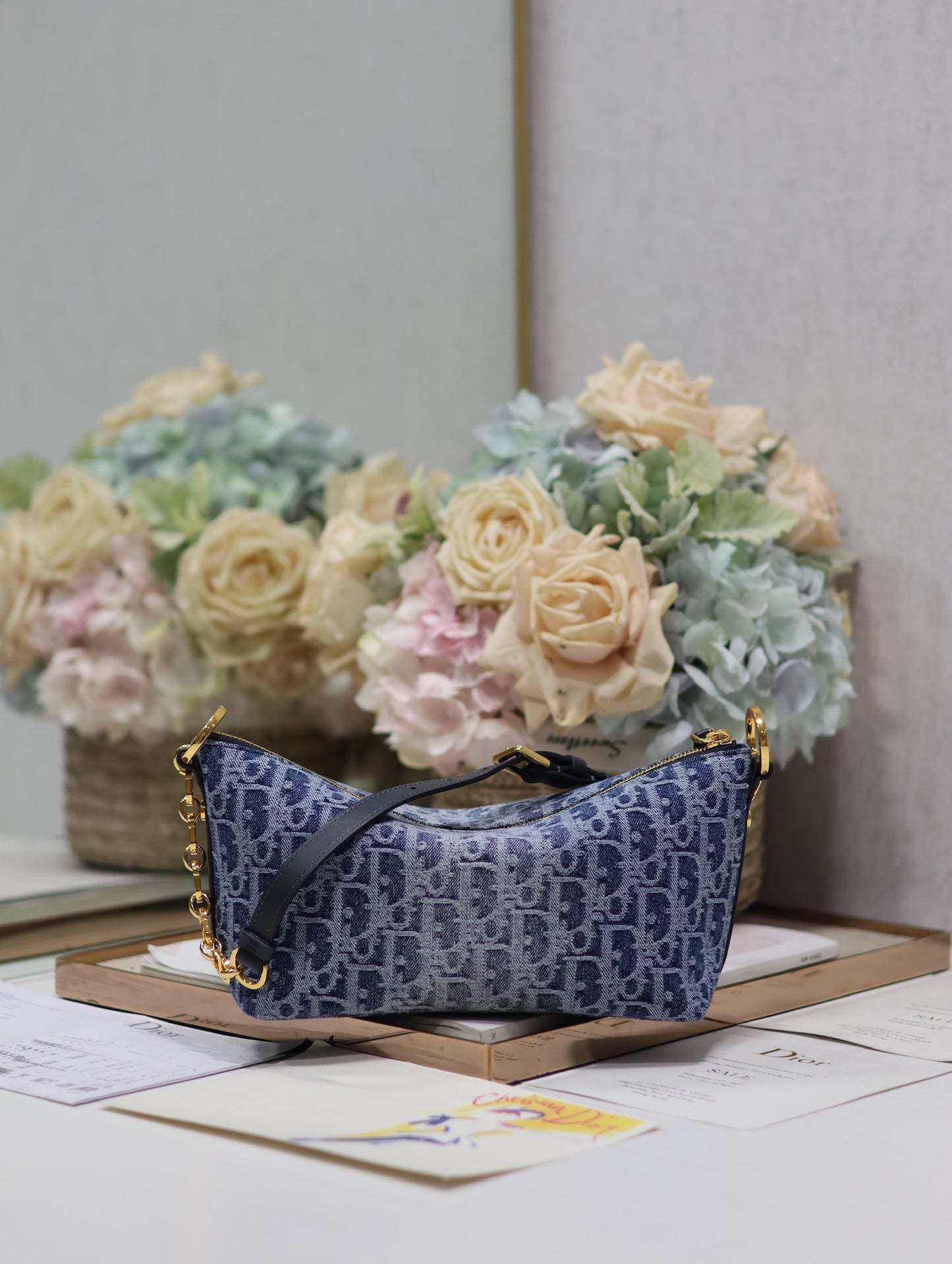 Chic Blue Monogram Oblique Hobo Bag with Gold Chain and Adjustable Shoulder Strap