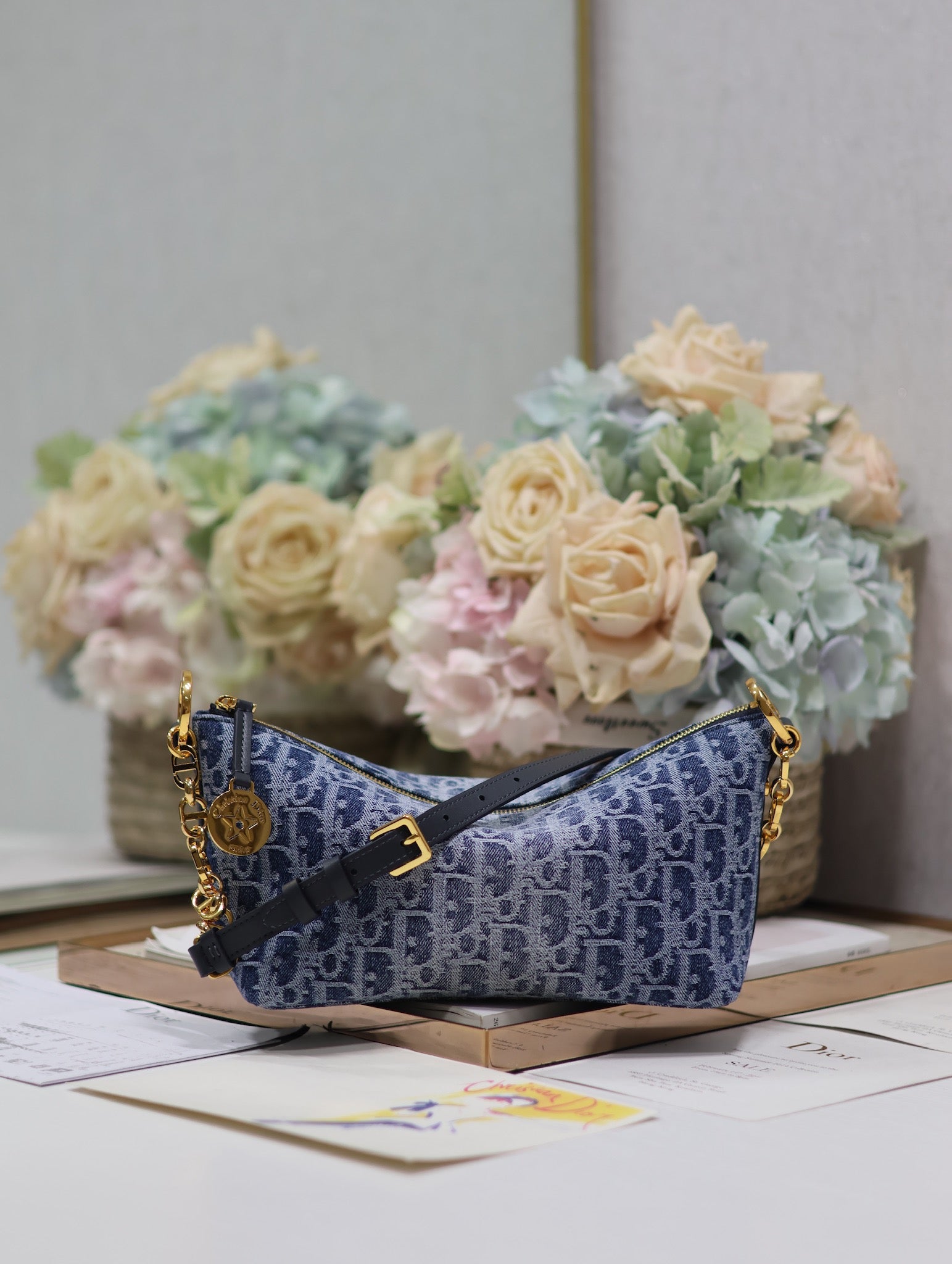 Chic Blue Monogram Oblique Hobo Bag with Gold Chain and Adjustable Shoulder Strap
