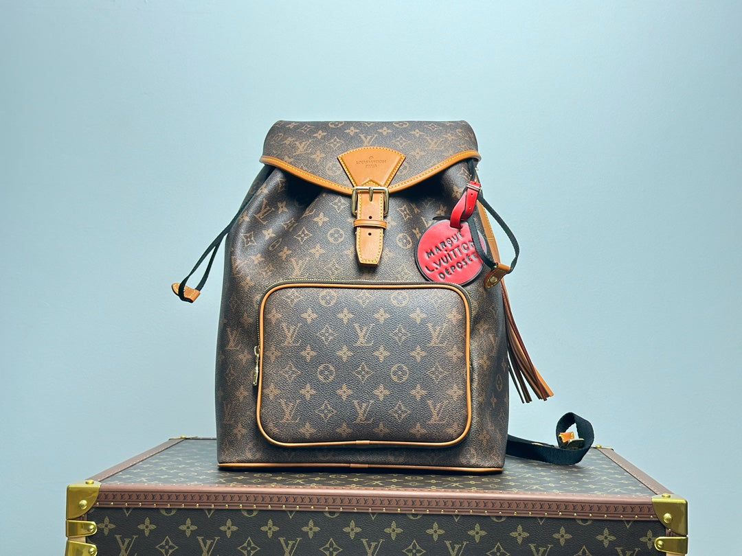 Louis Vuitton Monogram Montsouris Backpack with Fringe Tassel and Heart Charm
