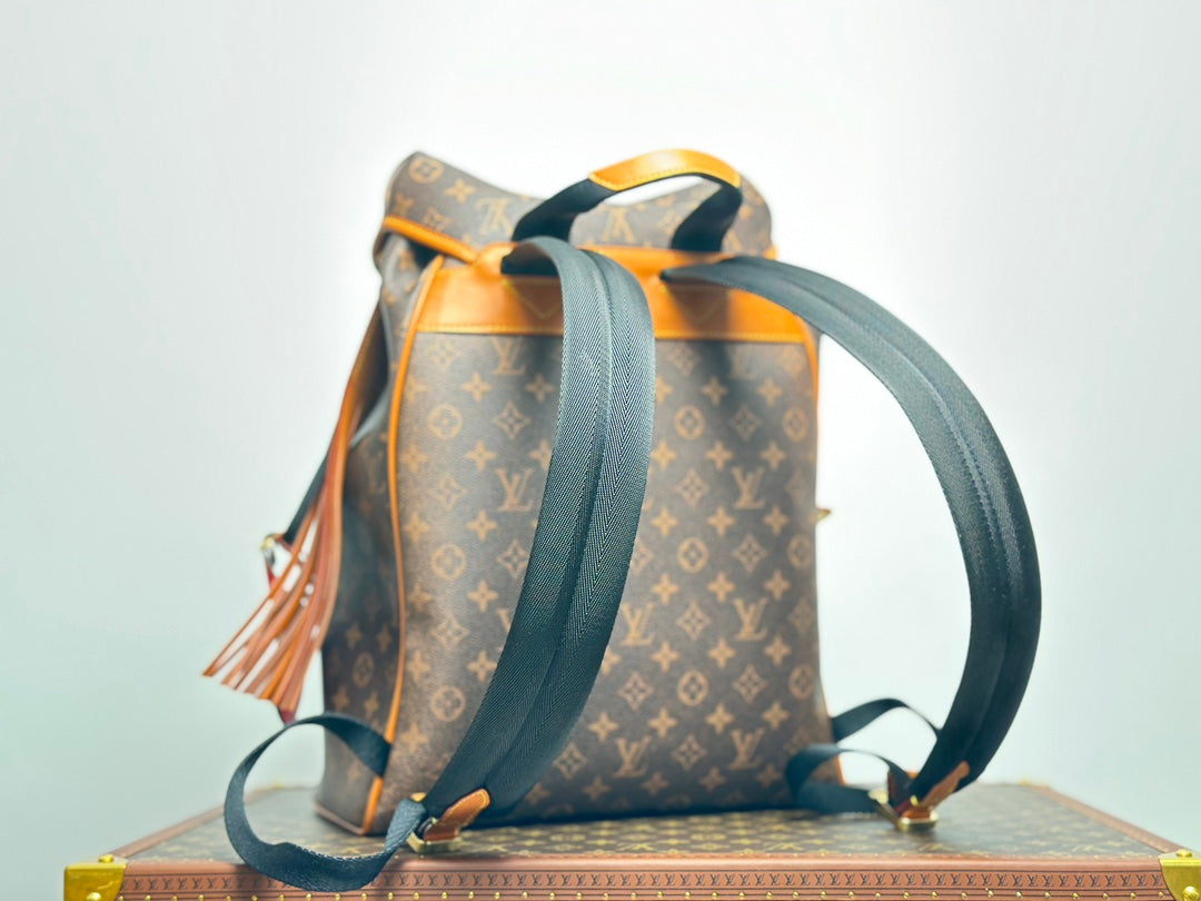 Louis Vuitton Monogram Montsouris Backpack with Fringe Tassel and Heart Charm